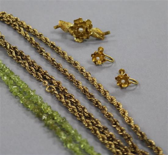 A 9ct gold ropetwist link chain, 15 grams, a flower brooch and earrings set with pearls, stamped 18k, gross 7.4 grams